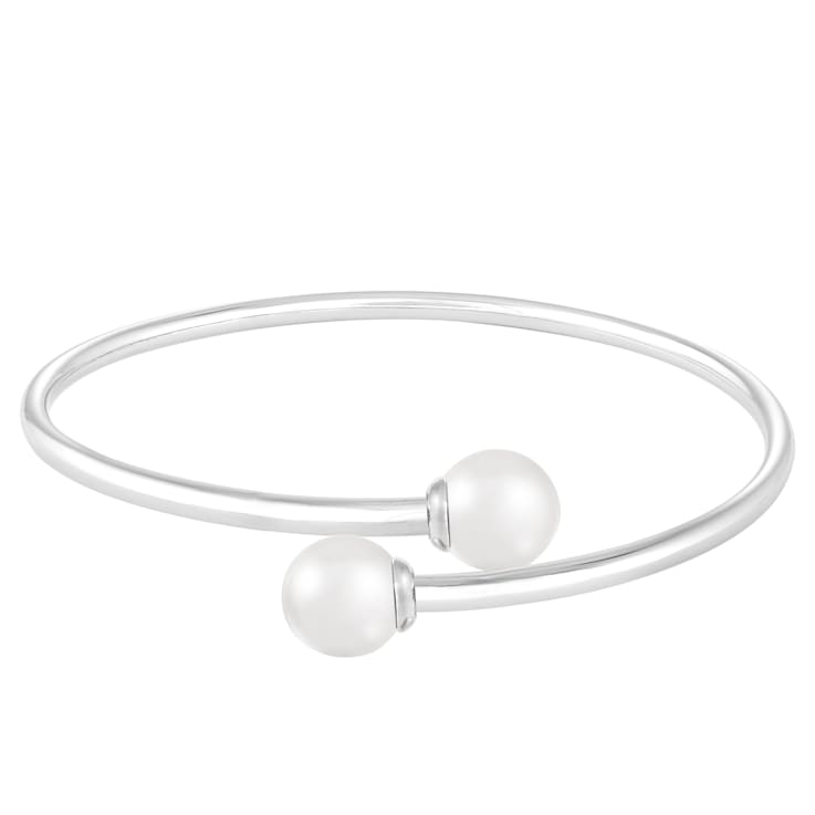 Sterling silver rhodium plated bangle with 8-9mm round shaped white
Japanese Akoya Pearls