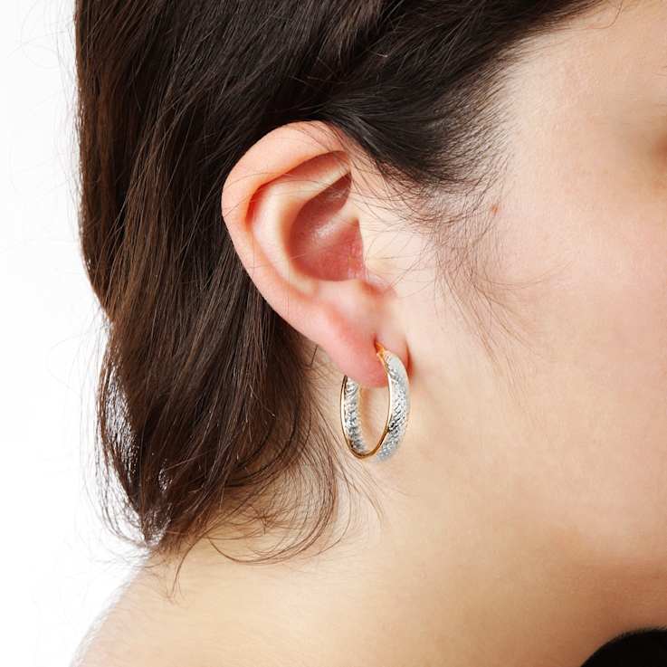 Sterling Silver and 18K Yellow Gold Over Sterling Silver Diamond Cut
Two-tone 1" Hoop Earrings