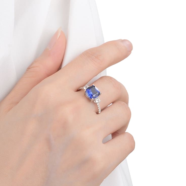 Asscher Cut Blue Lab Created Sapphire Ring with Round White Topaz
Rhodium Over Sterling Silver Ring