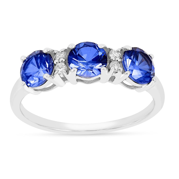 Blue Sapphire and Moissanite 3-Stone RingRhodium Over Sterling Silver
Round Lab Created