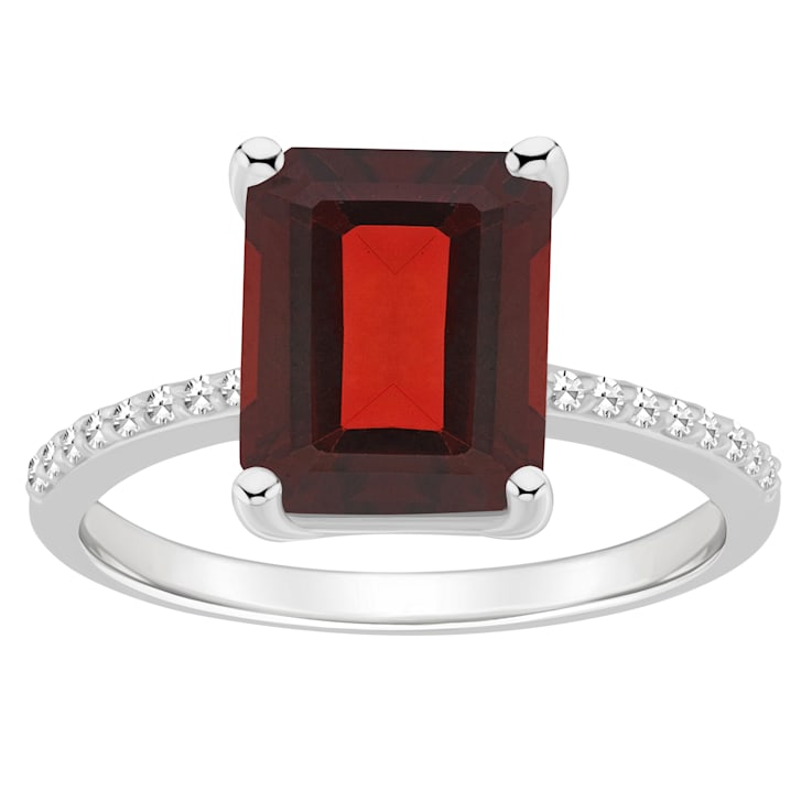 10x8mm Emerald Cut Garnet and 1/10 ctw Diamond Rhodium Over Sterling
Silver Ring