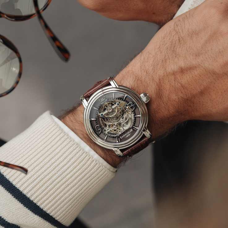 Thomas Earnshaw Longcase Automatic Gray Dial Brown Stainless Steel Band
Skeleton Watch