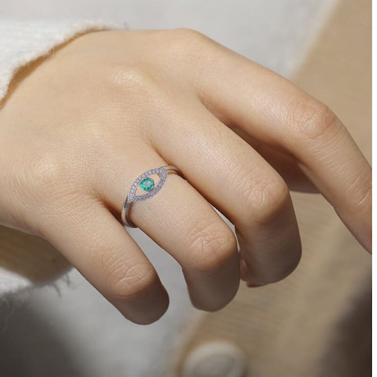 Emerald with Moissanite Accents Rhodium Over Sterling Silver Evil Eye
Halo Ring
