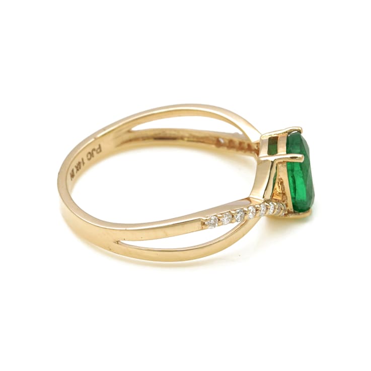1.09 Ctw Emerald with 0.12 Ctw Diamond Ring in 14K