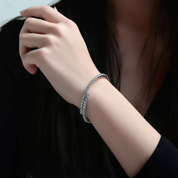 Bypass CZ Tennis Bracelet In White Rhodium Over Brass