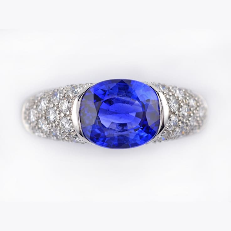Oval Blue Sapphire and White Diamond Platinum Ring. 4.47 CTW