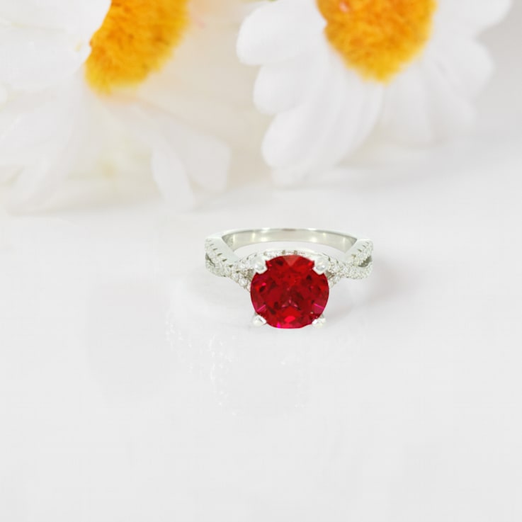 Red Lab Created Ruby with Moissanite Accent Rhodium Over Sterling Silver Ring