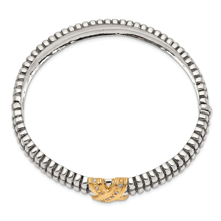 Sterling Silver with 14K Gold Over Sterling Silver Oxidized 1/15ct.
Diamond Bangle Bracelet
