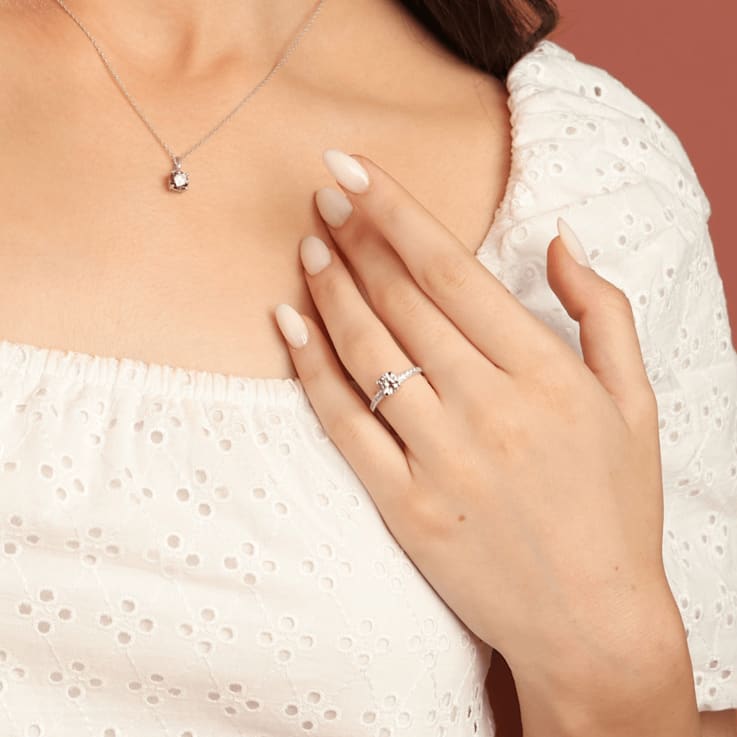 Lab Created Pink Sapphire with White Topaz Accents Rhodium Over Sterling
Silver Ring