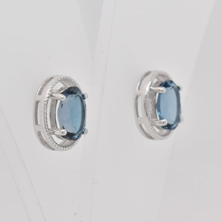 1.74ctw Oval London Blue Topaz Rhodium Over Sterling Silver Stud Earrings