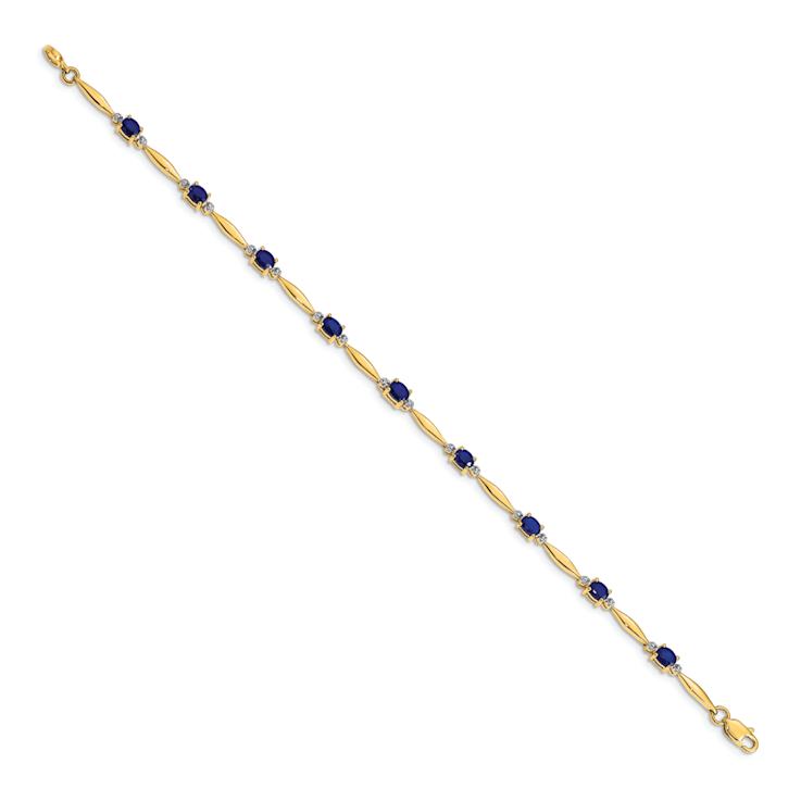 10k Yellow Gold and Rhodium Over 10k Yellow Gold Diamond and Oval
Sapphire Bracelet
