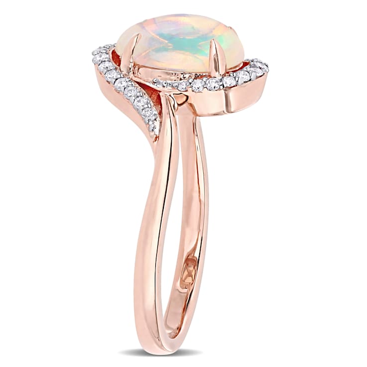 1ct Blue Ethiopian Opal And 0.14ctw Diamond 10k Rose Gold Halo Ring