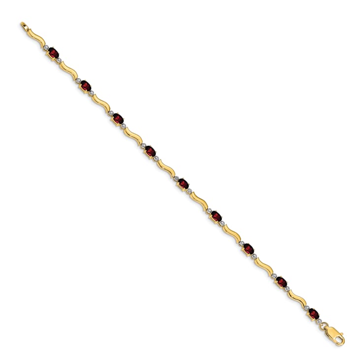14k Yellow Gold and Rhodium Over 14k Yellow Gold Fancy Diamond and
Garnet Bracelet