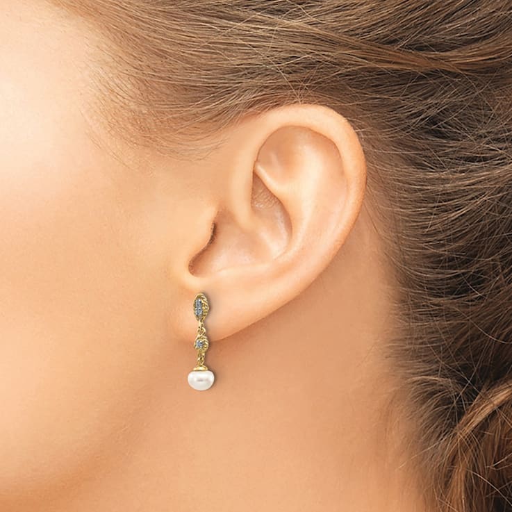 14K Yellow Gold with Rhodium 6-7mm Semi-round Freshwater Cultured Pearl
0.02ct Diamond Earrings
