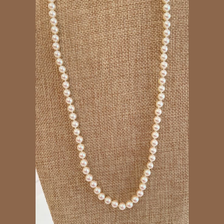 Rare to find 6 - 6.75mm Flawless Japanese Akoya Cultured Pearl Strand,
14K White Gold clasp