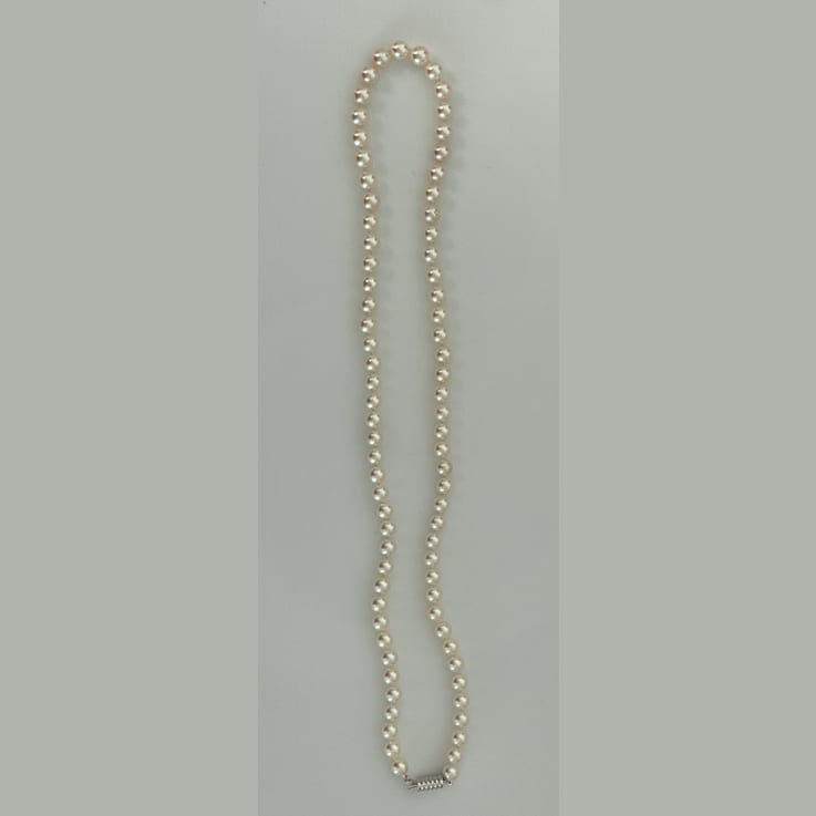 Rare to find 6 - 6.75mm Flawless Japanese Akoya Cultured Pearl Strand,
14K White Gold clasp