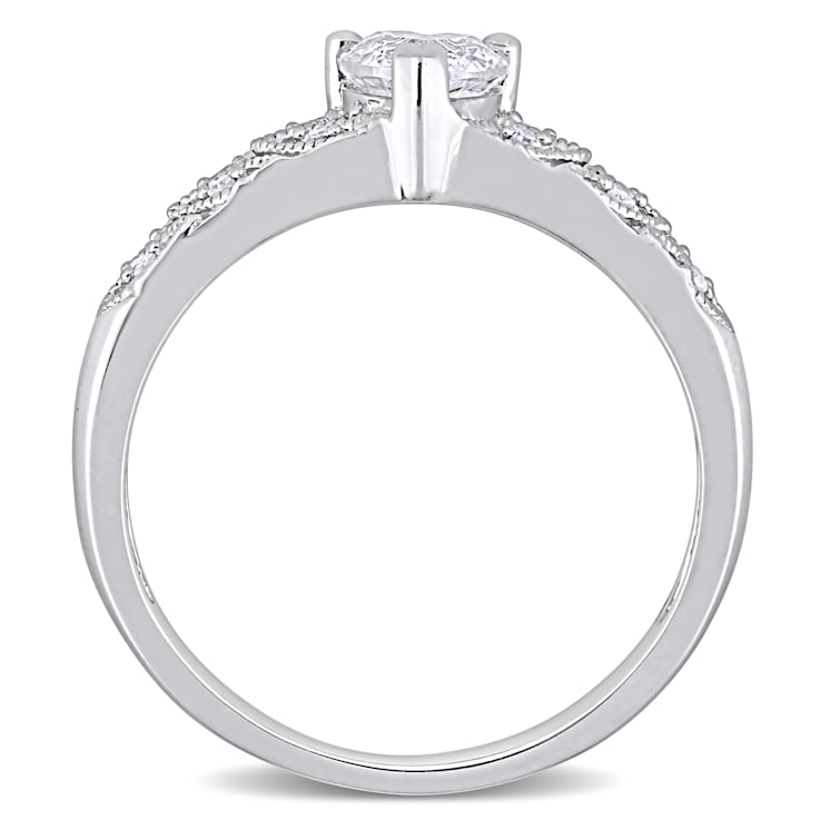 3/5 CT TGW Created White Sapphire and Diamond Accent Vintage Ring in
Sterling Silver