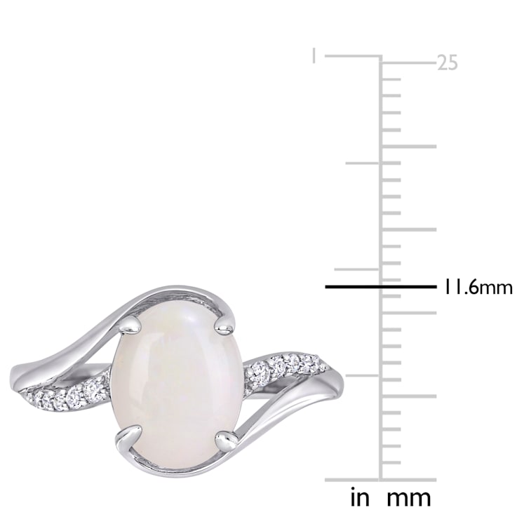 1 5/8 CT TGW Opal and 1/10 CT TW Diamond Twist Ring in Sterling Silver