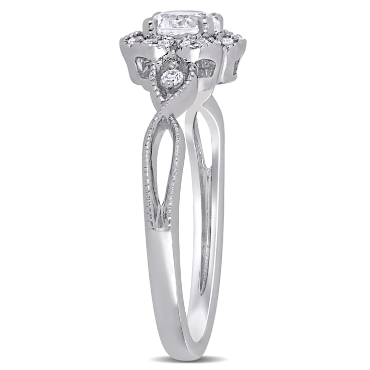 5/8 CT TGW Created White Sapphire and 1/10 CT TW Diamond Vintage Floral
Ring in Sterling Silver