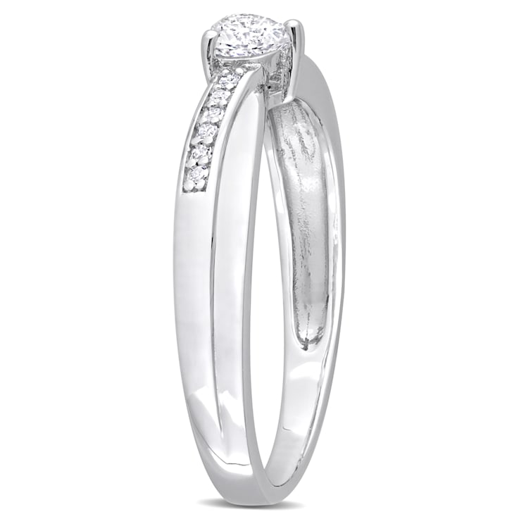 1/4 CT TGW Created White Sapphire and Diamond Accent Heart Ring in
Sterling Silver