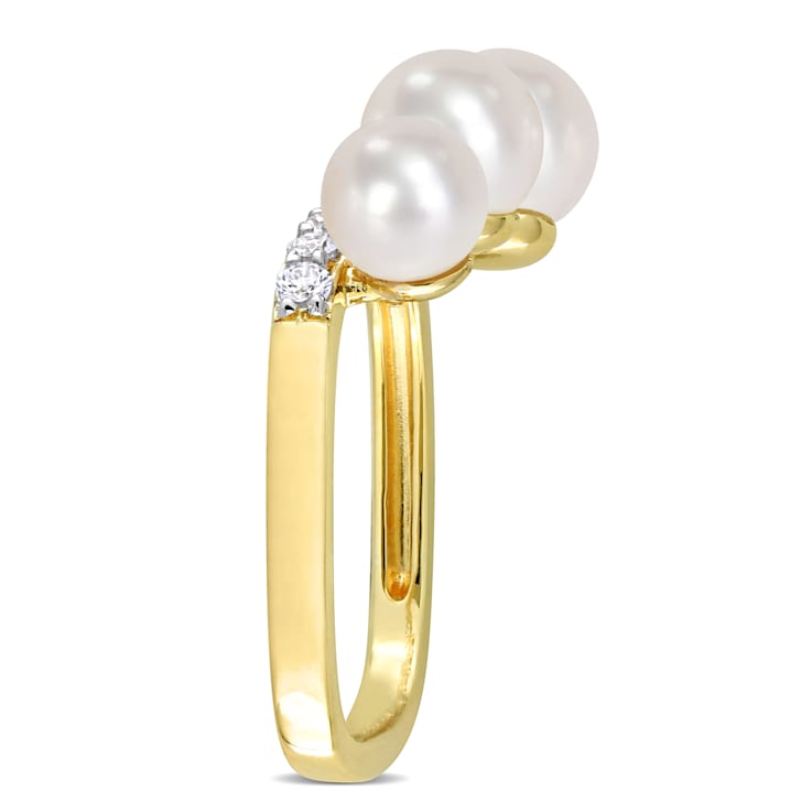 6-7.5 MM Freshwater Cultured Pearl & 3/8 CT TGW White Topaz Ring in
Yellow Plated Sterling Silver