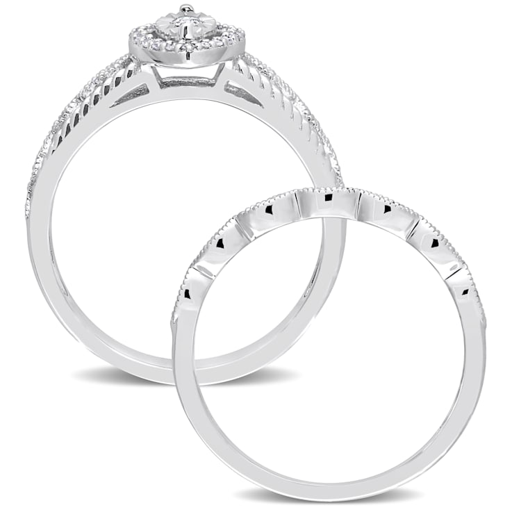 1/5 CT TW Diamond Oval Halo Bridal Ring Set in Sterling Silver