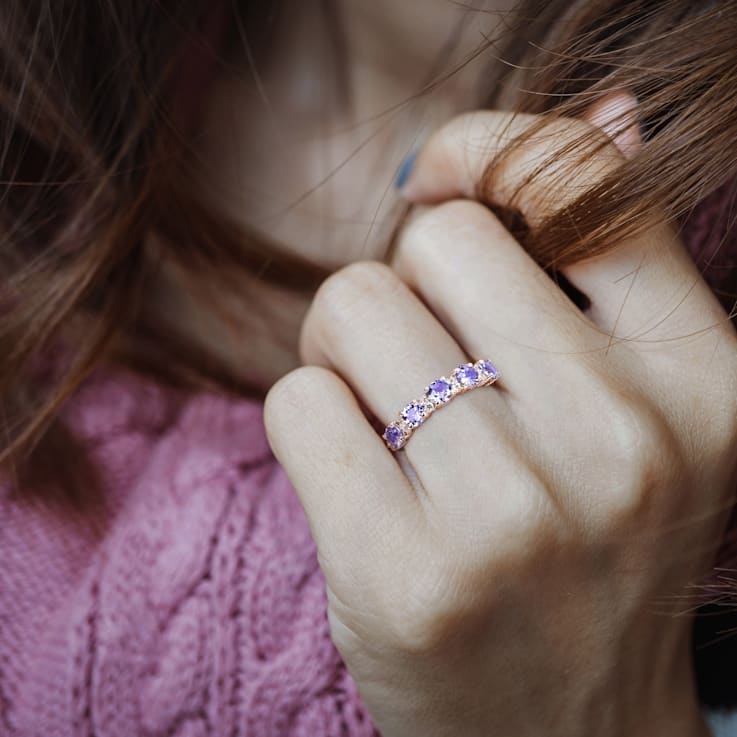 1 1/2 CTW Tanzanite and White Topaz Anniversary Style Band Ring in
Sterling Silver