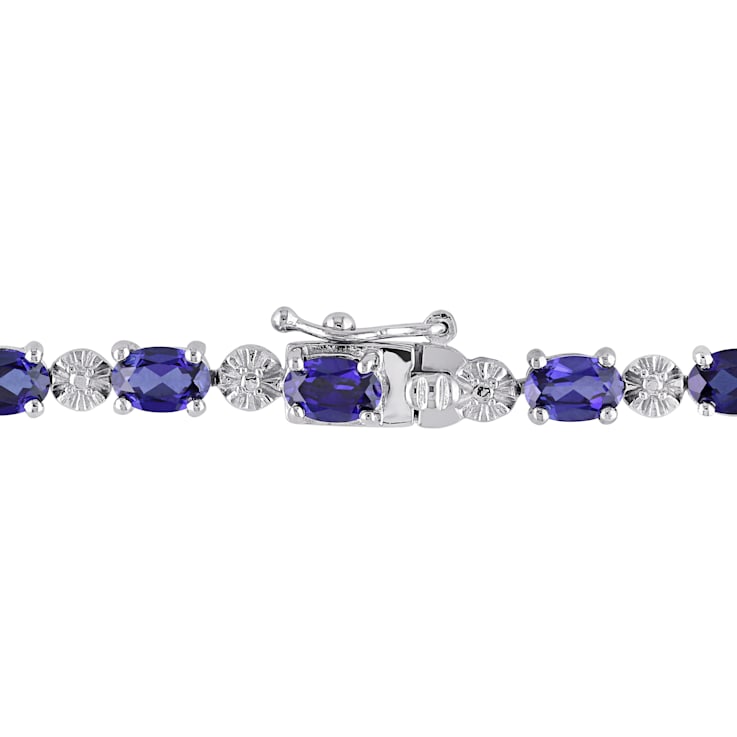 9 7/8 CT TGW Created Blue Sapphire and Diamond Accent Bracelet in
Sterling Silver