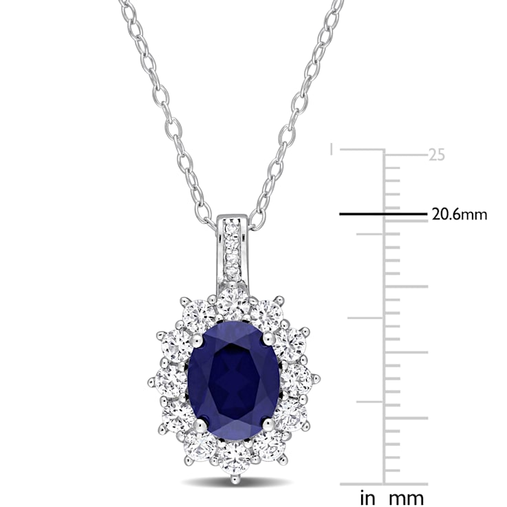 4 CT TGW Created Blues, White Sapphire and Diamond Accent Pendant with
Chain in Sterling Silver