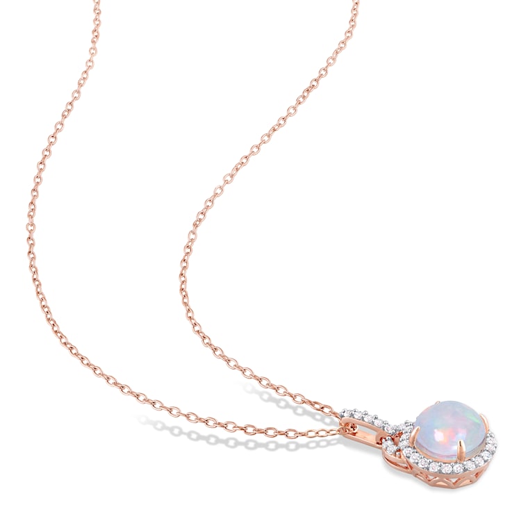 3 1/4 CT TGW Blue Ethiopian Opal and White Topaz Pendant with Chain in
Rose Plated Sterling Silver