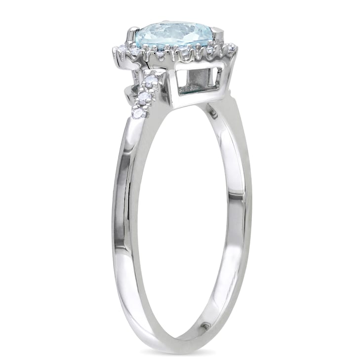 5/8 CT TGW Aquamarine and 1/10 CT TW Diamond Heart Halo Ring in Sterling Silver