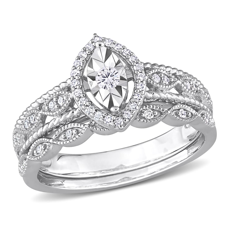 1/5 CT TW Diamond Oval Halo Bridal Ring Set in Sterling Silver