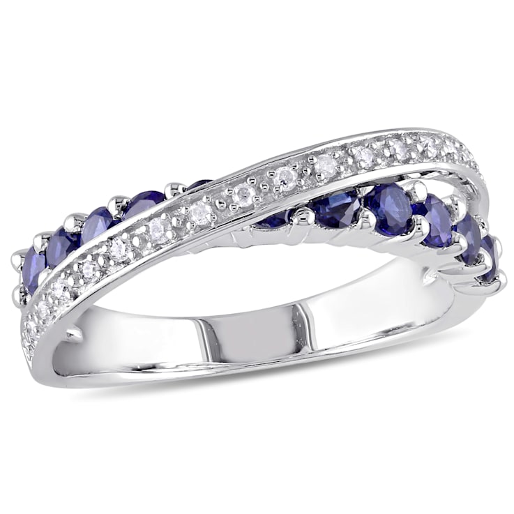 1 CT TGW Created Blue Sapphire and 1/10 CT TW Diamond Crossover Ring in
Sterling Silver