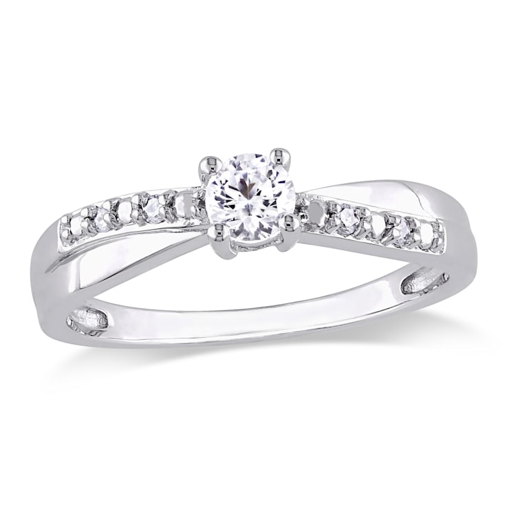 1/3 CT TGW Created White Sapphire and Diamond  Accent Crossover Ring in
Sterling Silver