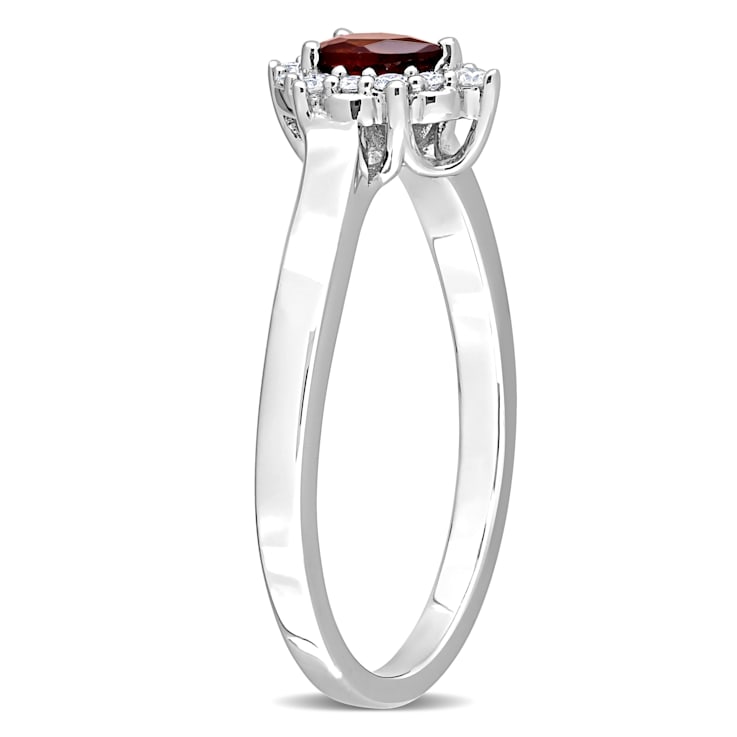 1/4 CTW Garnet and 1/10 CTW Diamond Teardrop Ring in Sterling Silver