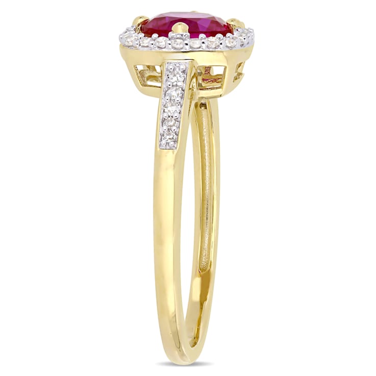 1 CT TGW Created Ruby and 1/7 CT TW Diamond Halo Ring in 10K Yellow Gold