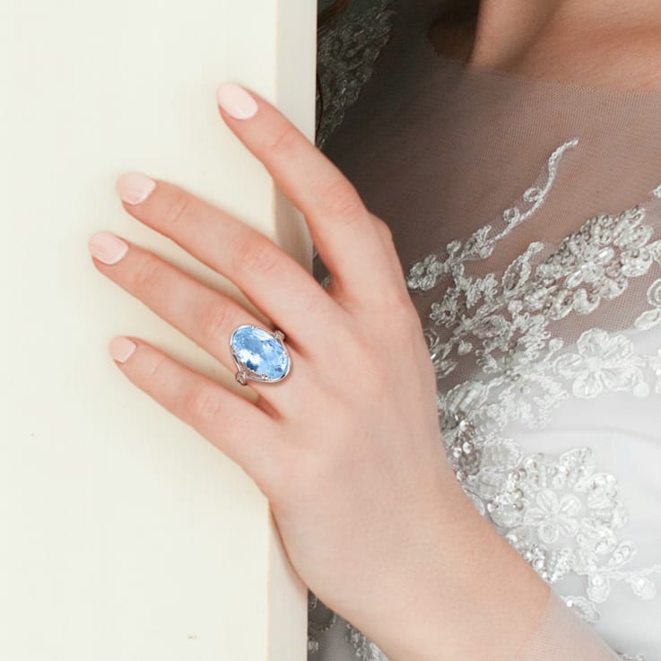 13 3/5 CT TGW Sky Blue Topaz and White Topaz Solitaire Ring in Sterling Silver