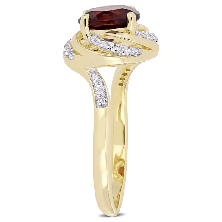2 1/7 CTW Garnet, White Topaz and Diamond Swirl Ring in Yellow Plated
Sterling Silver