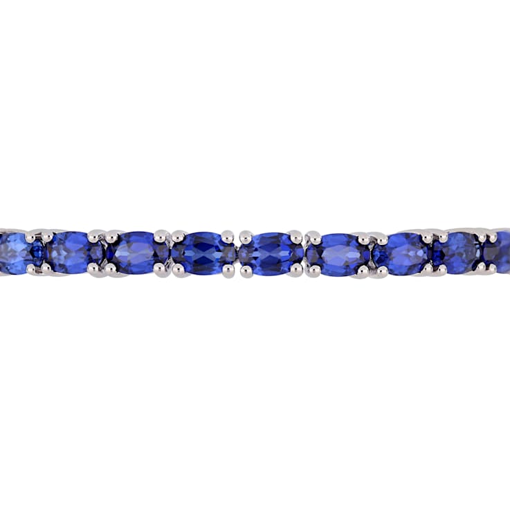 8-1/4 CT TGW Oval-Cut Created Blue Sapphire Bangle in Sterling Silver