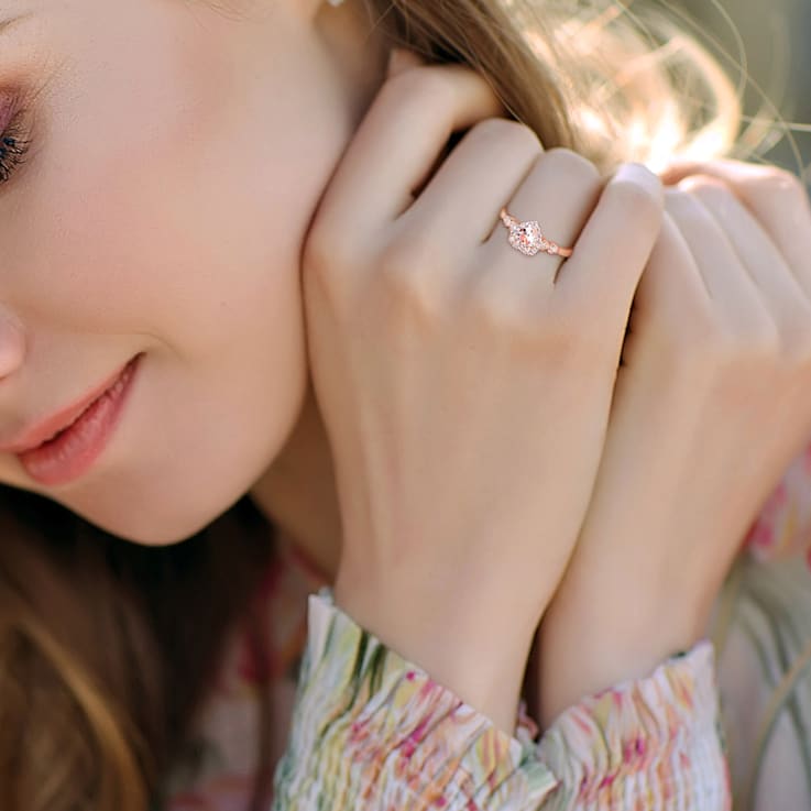 5/8 CT TGW Morganite, White Topaz and Diamond Accent Heart Ring in Rose
Plated Sterling Silver
