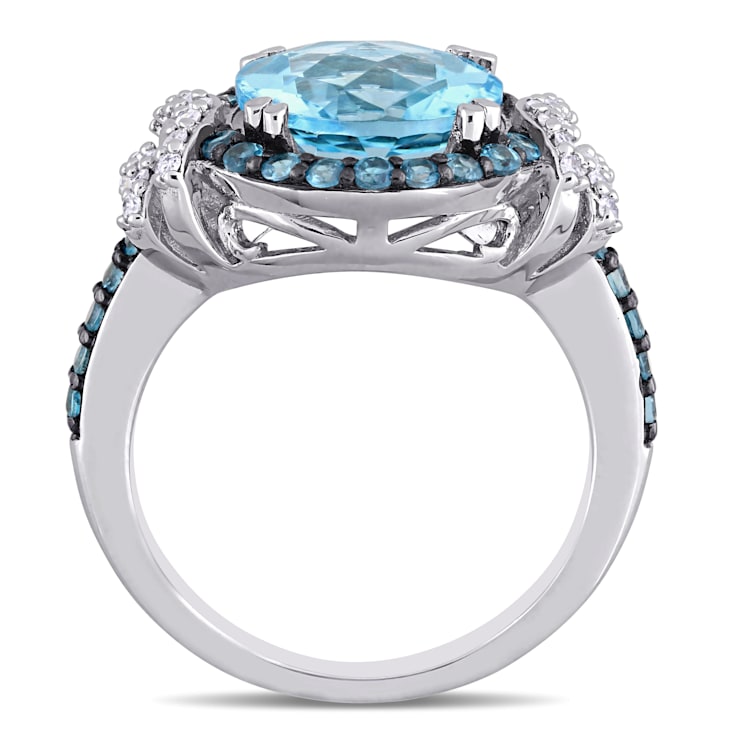 4 4/5 CT TGW London Blue and Sky Blue Topaz with 1/8 CT TW Diamond Halo
Ring in Sterling Silver