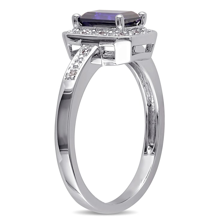 1 1/2 CT TGW Created Blue Sapphire and Diamond Accent Halo Ring in
Sterling Silver