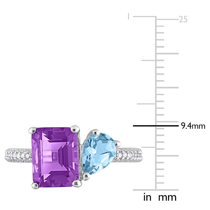 3 1/10 CT TGW Amethyst and Sky Blue Topaz with 1/10 CT TW Diamond Toi et
Moi Ring in Sterling Silver
