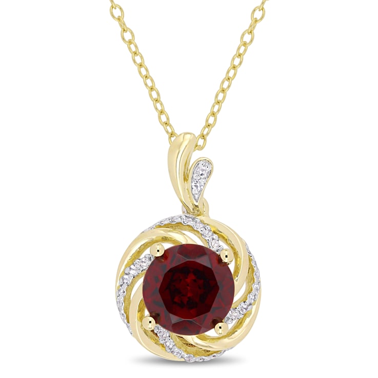 2 1/7 CT TGW Garnet, White Topaz and Diamond Pendant with Chain in
Yellow Plated Sterling Silver