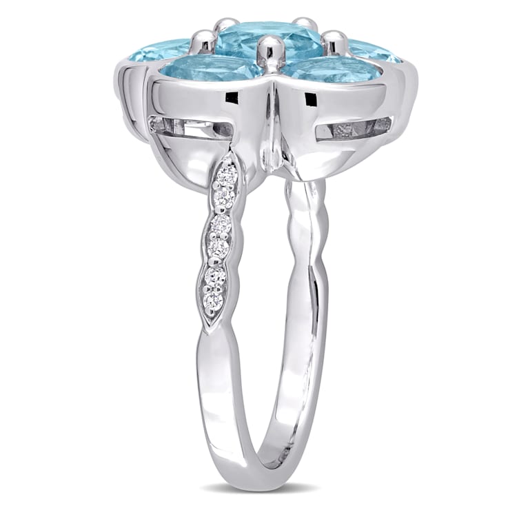 3 1/3 CT TGW Sky Blue Topaz and Diamond Accent Floral Ring in Sterling Silver
