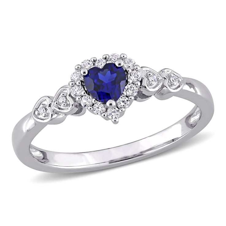 3/8 CT TGW Created Blue and White Sapphire, Diamond Accent Halo Ring in
Sterling Silver