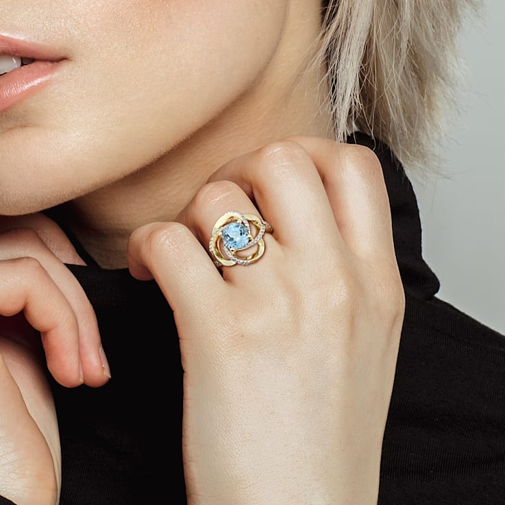 2 3/5 CT TGW Sky Blue and White Topaz Swirl Ring in Yellow Plated
Sterling Silver