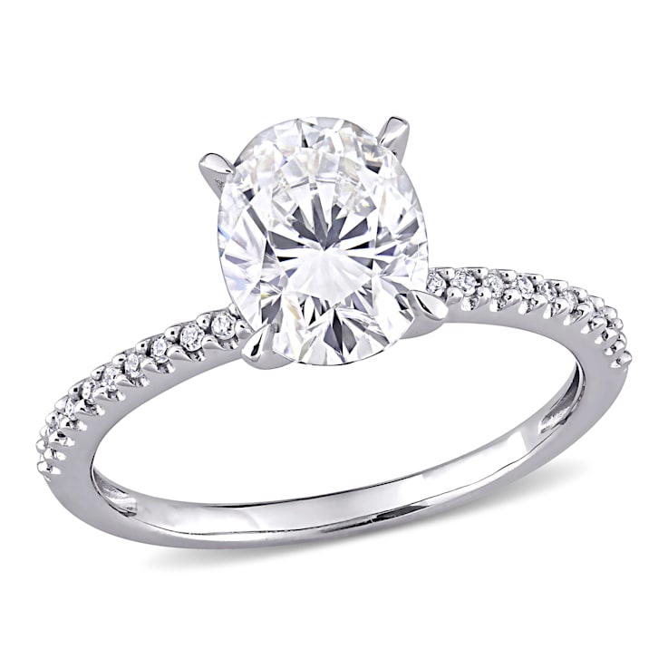 2 CT DEW Created Moissanite and 1/10 CT TW Diamond Engagement Ring in
14K White Gold