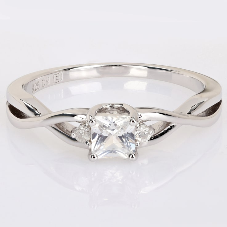 3/8 CT TGW Created White Sapphire and Diamond Accent Infinity Ring in
Sterling Silver