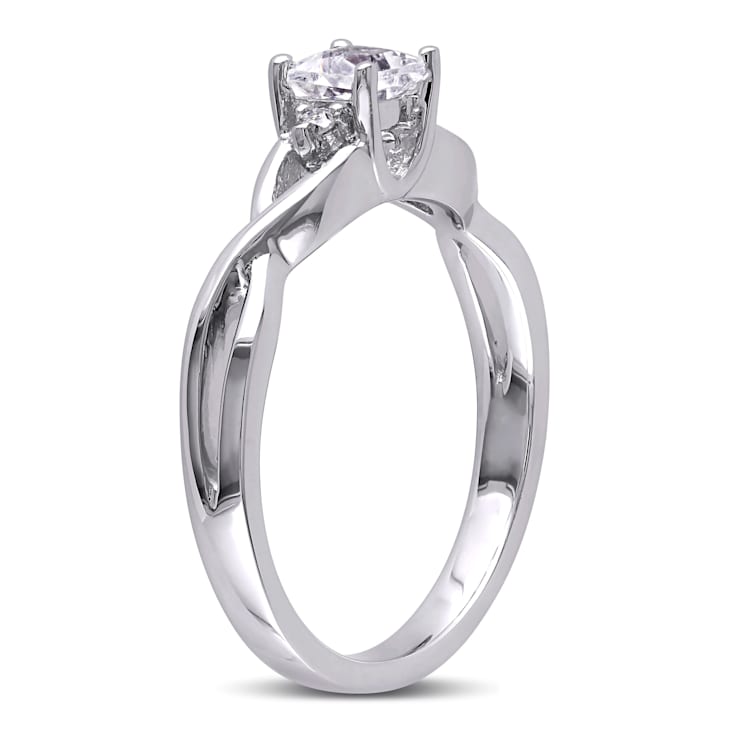 3/8 CT TGW Created White Sapphire and Diamond Accent Infinity Ring in
Sterling Silver
